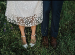 Bride and Groom shoes and daisy dress